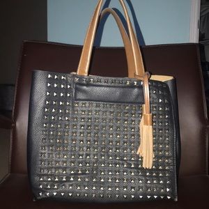 Real leather studded handbag